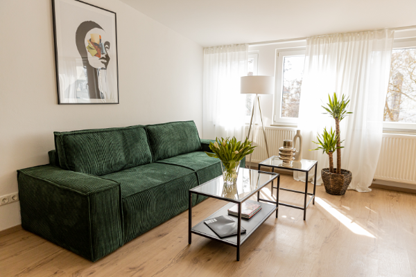 Bequeme Schlafcouch im Wohnzimmer - Ferienwohnung Landshut