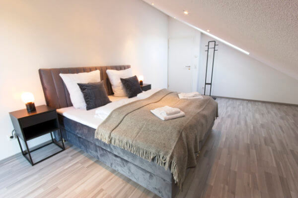 Bedroom with box-spring bed in Rheinfelden (Baden)