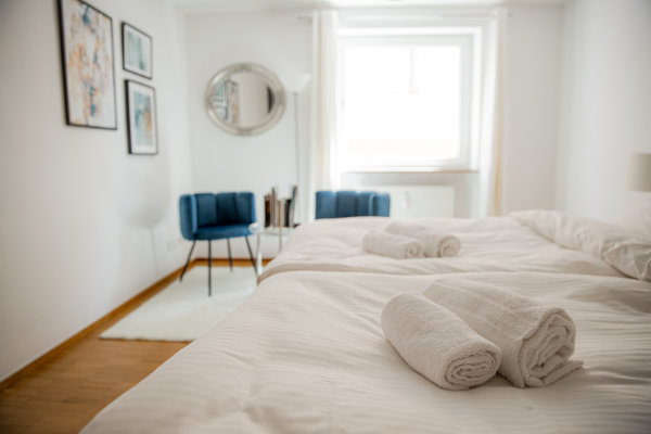 Bedroom with darkening, clothes hanger and iron